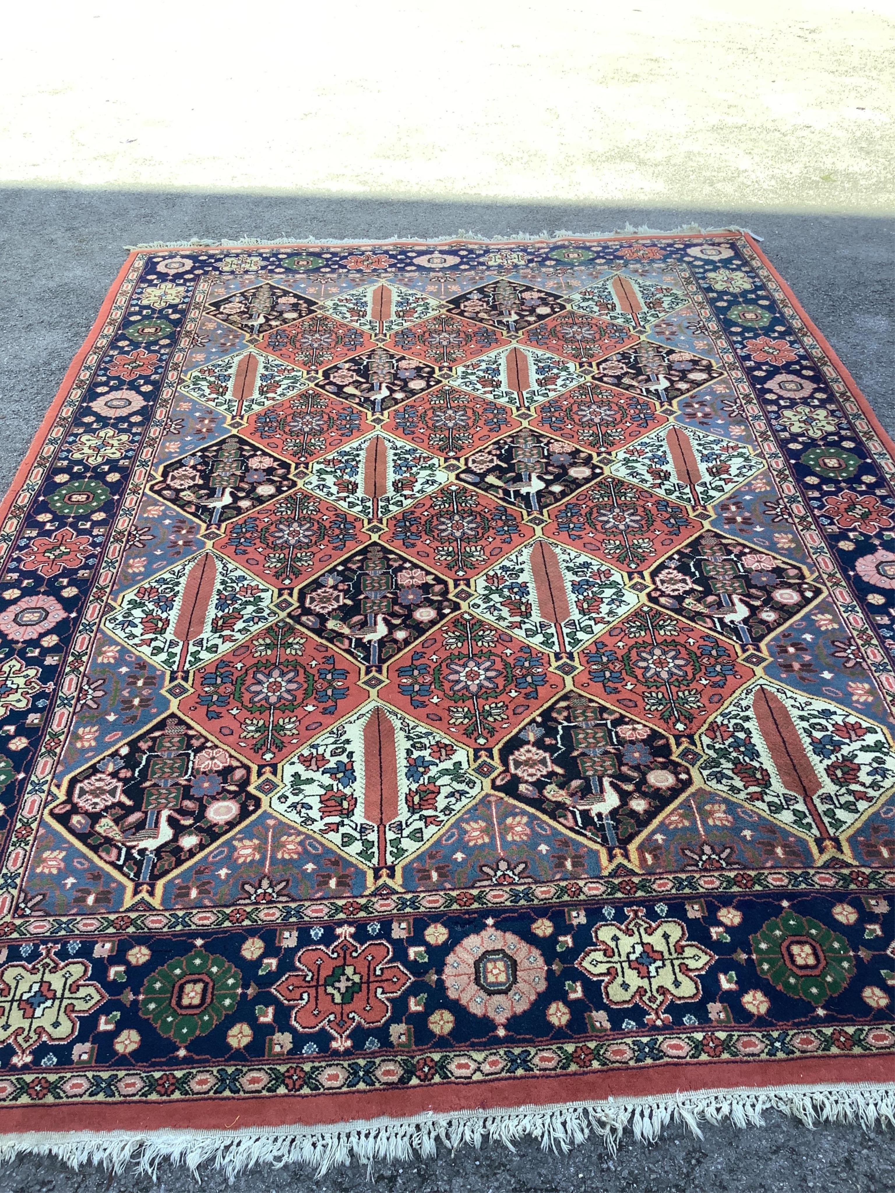 A Caucasian style brick red ground carpet, approximately 350cm x 150cm condition fair.